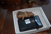 Kodak No 8A folding camera and two leather cases in a white box.