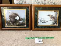 Two framed prints side by side showing wood frames with green marble-style mats, gold liners and eagle images