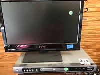 Photo of Sansui 18 inch television on top of Magnavox DVD player.