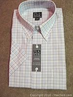 Front of one of the two new men's Jos. A. Banks short sleeve shirts, showing plaid pattern, button-down collar, and attached tag.