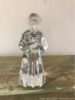 Front view of the 7-inch tall Baccarat crystal Joseph figurine showing details of the face and upper body.