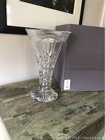 Front view of vase and original box on tabletop