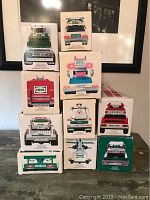 Frontal view of stacked boxes showing front panels with year labels