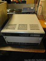 Front, top and side view of the NF Electronic Instruments 5060A Frequency Response Analyzer showing body and panel layout.