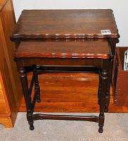 Front view of both nesting tables stacked