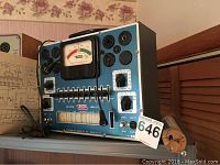 Front view of EICO Model 625 tube tester showing analog meter, tube sockets, switches and branding.