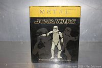 Front view of original box showing 'Metal Star Wars Stormtrooper Commander'.