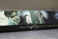 Box front with Harry Potter image and title 'Harry Potter and the Deathly Hallows'