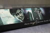 Photo of wand box packaging showing Harry Potter image and product name on the side.
