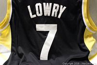 Close-up of black back of jersey with Lowry and number 7 in white letters and numbers.