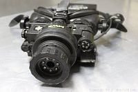 Front view showing objective lens and IR LED ring