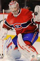 Full view of signed Carey Price photo in Montreal Canadiens goalie gear, with autograph in blue marker.