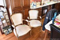 Front view of both chairs showing overall condition