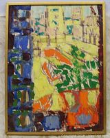 Frontal image of the abstract oil painting with vibrant bold colors framed.