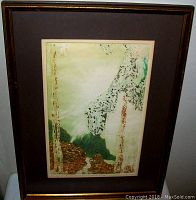 Overall view of the framed mixed media abstract artwork showing colors and composition.