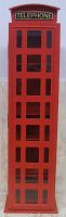 Front view of red UK telephone booth shaped storage box with glass panel door and TELEPHONE sign on the top.