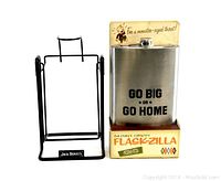 Jack Daniels black metal cradle/swing stand and large Flask-Zilla flask in packaging, displayed together.
