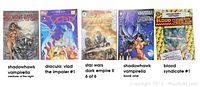 Five comic books laid out showing title and cover art including Shadowhawk Vampirella creatures, Dracula Vlad the Impaler, Star Wars Dark Empire II, Shadowhawk Vampirella Book One, and Blood Syndicate.