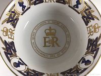 Interior base of the bowl showing gold circular inscription: 'Queen Elizabeth II Silver Jubilee 1977 - Head of The Commonwealth' with crown and E II R emblem