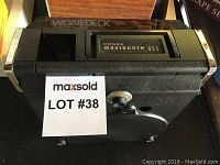 Top view of Kodak Moviedeck 455 projector showing brand label and overall design