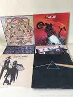 Five vintage vinyl records displayed including Deep Purple Machine Head, Meat Loaf Bat Out of Hell, Fleetwood Mac Rumours, and Pink Floyd Dark Side of the Moon.