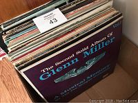 Stack of various vintage vinyl albums including The Second Solid Album of Glenn Miller.