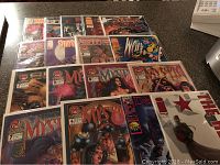 Full set of 15 comic books laid out showing front covers, including Mystic issues and Edge, The Darkness titles.