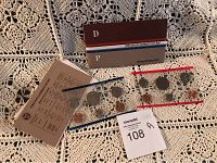 Two sets of 1984 uncirculated coins in original packaging with outer sleeve labeled 'D' and 'P'. Displaying the full lot.