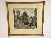 Full view of the framed lithograph showing the street scene in Rothenburg with a mix of timber-framed buildings and a tower.