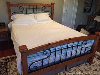 Assembled bed frame with mattress showing overall appearance in bedroom