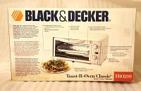Photo of the Black & Decker Toast-R Oven Classic TR0210 toaster oven box showing branding, product image, and features.