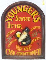 Front view of the Younger’s Scotch Bitter advertising sign showing colors, lettering and central relief figure.