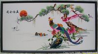 Full view of the framed Chinese silkscreen artwork showing colorful birds and nature scene with red sun and pine branch.
