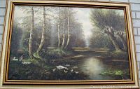 Front view of large framed oil painting showing ducks at the lake among trees, highlighting the overall composition and condition.