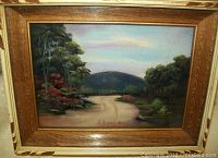 Front view of the pastel painting showing the landscape and the signature.