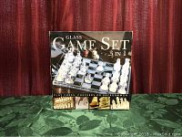 Box image of the Glass Game Set 3 in 1 showing set is for chess, checkers, or backgammon