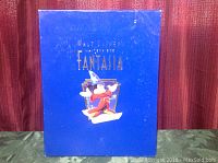 Front cover of blue Fantasia collection box featuring Mickey Mouse sorcerer artwork