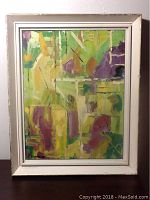 Frontal view of the abstract oil painting titled "Dismantling," showing dominant colors green, yellow, and purple, framed with a simple off-white wooden frame.