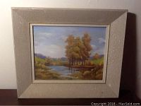 Framed view of the oil painting showing the entire artwork and frame.