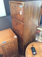 Full view of tall Drexel lingerie chest showing dark wood finish and six drawers.