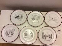 Set of six 8-inch dessert plates arranged 3 top, 3 bottom, showing black and red trim and various New Yorker comic illustrations at center.