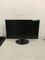Front view of Samsung LED monitor showing screen and base stand
