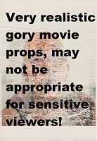 Photo warning about the gory nature of the props, overlay text on image.