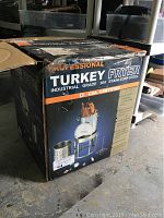 Box for industrial grade stainless steel turkey fryer, CSA certified, showing brand Professional and product image.