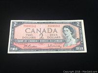 Front side of the 1954 Canadian 2 dollar bill showing Queen Elizabeth II portrait and denomination.