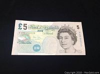 Front side of the 2002 Bank of England 5 Pound note featuring Queen Elizabeth II.