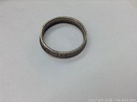 Silver ring made from 1969 German 2 Mark coin, showing detailed edge inscriptions.