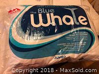 Blue Whale jumbo queen pillow in original sealed packaging with visible branding and size details