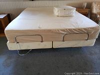 Full view of king size mattress and base from front