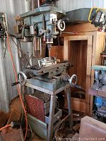 Full view of cast iron base, column, head and work table showing overall condition
